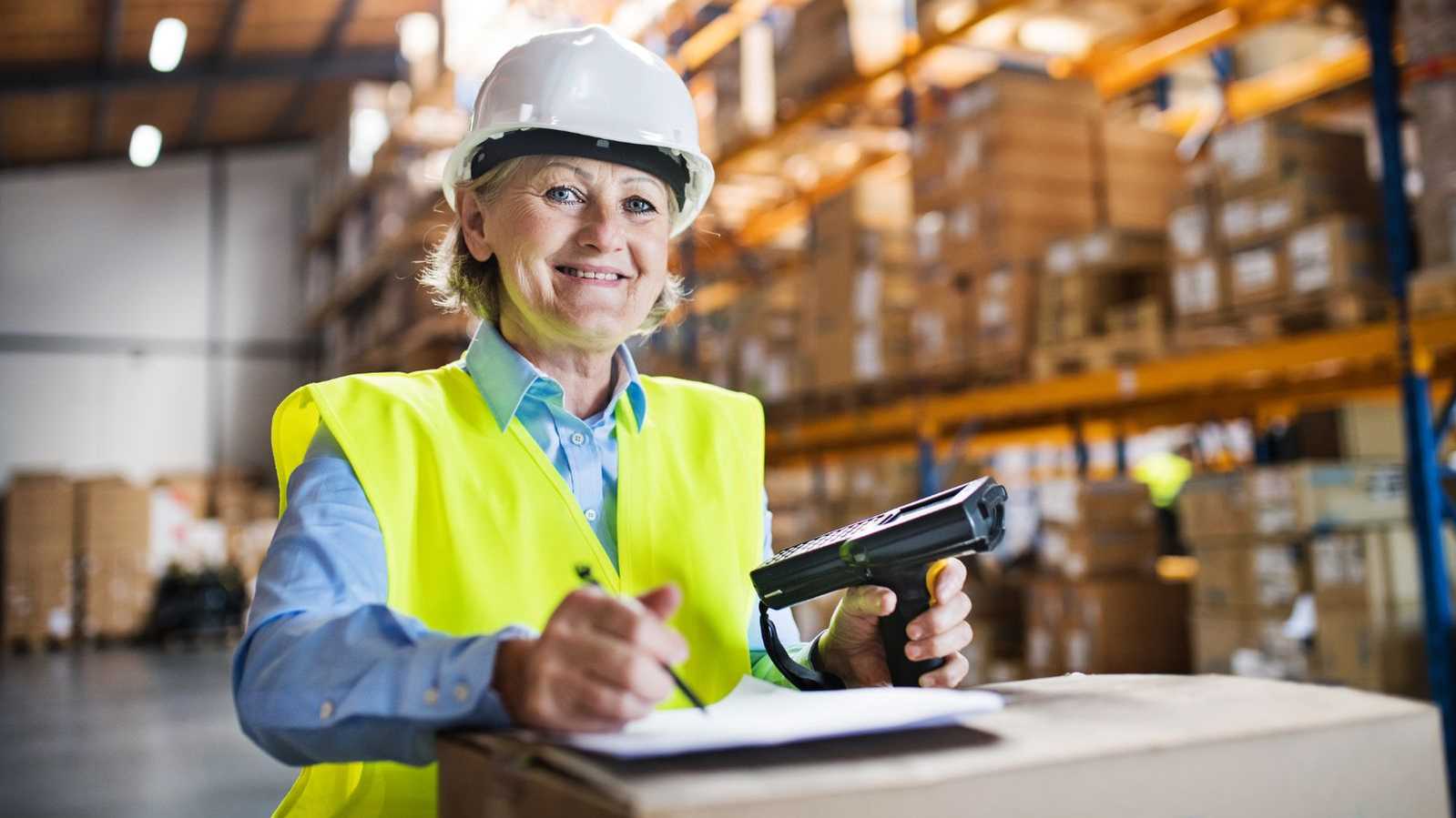 woman working in warehouse woman working in warehouse
