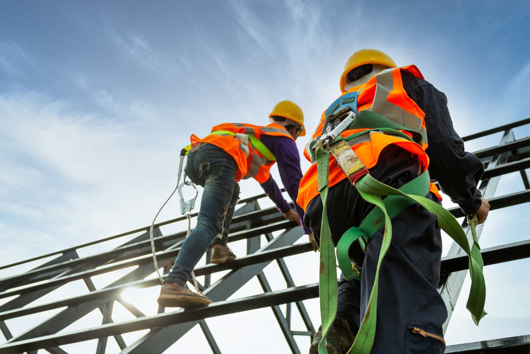 contractors putting together roof beams