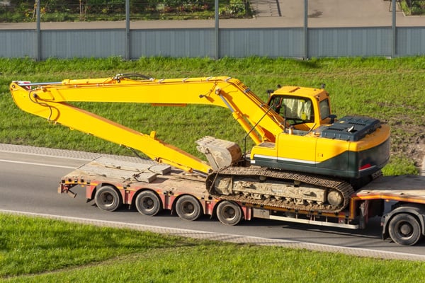 construction machinery on truck trailer