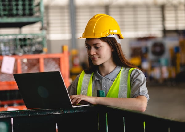 construction manager working on laptop