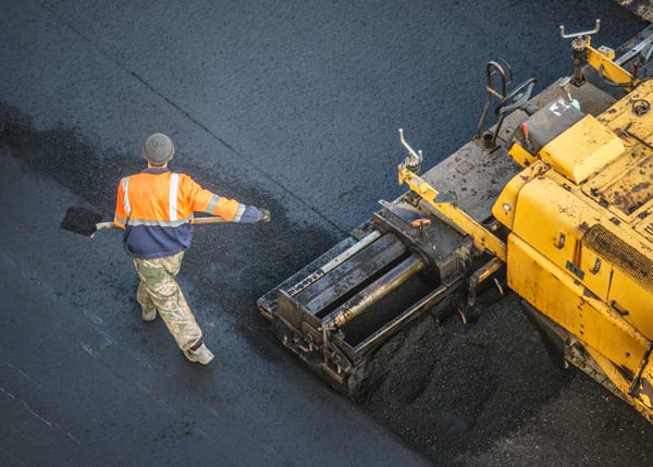 laying down asphalt