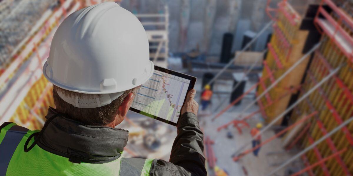 construction worker using technology